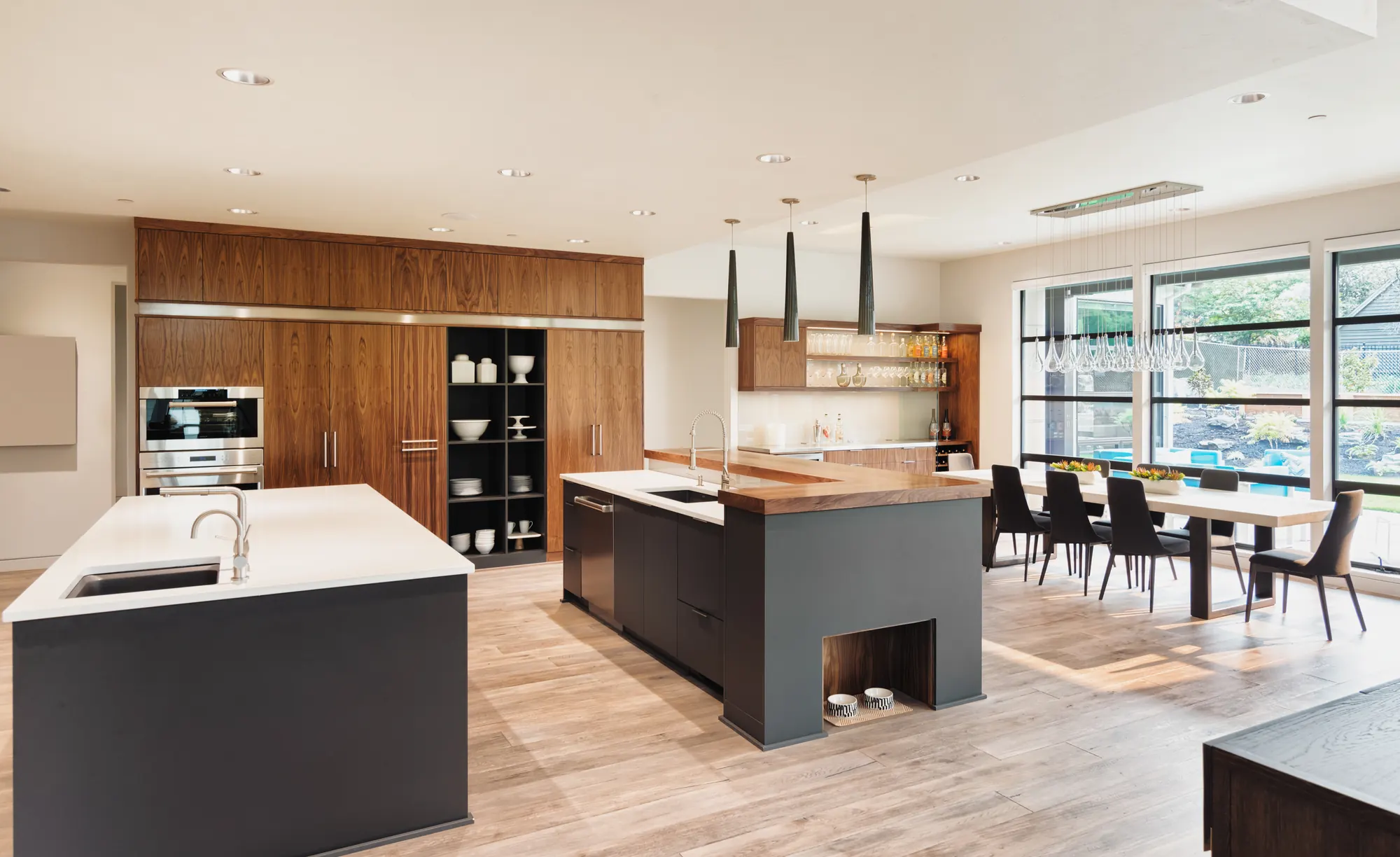 Renovated open-concept kitchen with warm wood cabinetry
