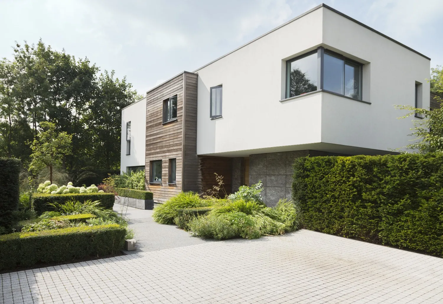Modern renovated home exterior with clean landscaping